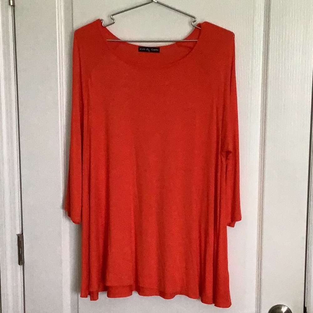 Misses/ladies long sleeve flare orange top. Like new